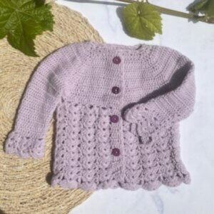 Babyvestje Bloem | Handgebreid babyvestje van Merinowol | Maat 56 t/m 68