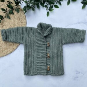 gehaakt babyjasje houtje touwtje merinowol